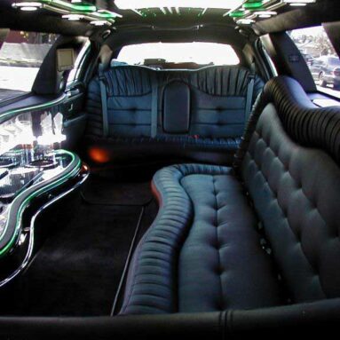 The interior of a stretch black Lincoln.