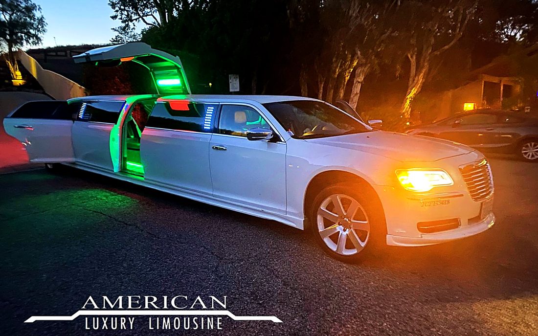 Chrysler 300 jet door limousine with doors open at night