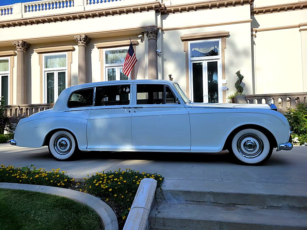 Classic Rolls-Royce limousine at a wedding venue