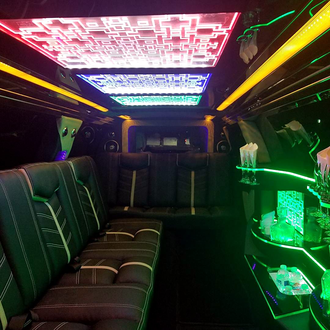 Lincoln Continental stretch interior in green lighting