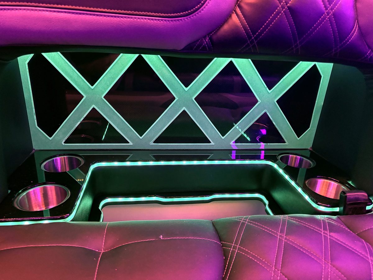 2024 Escalade bar detail in green lighting