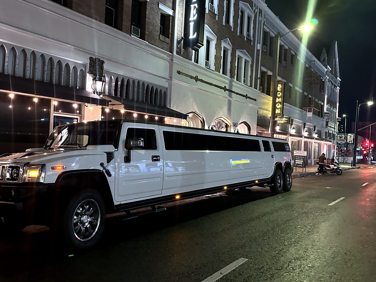 Six-wheel Hummer super stretch at night