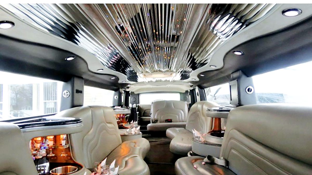 Hummer H2 stretch cream leather interior, daylight