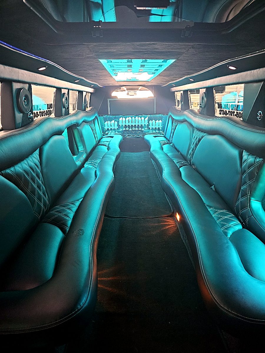 Hummer H2 stretch interior in teal lighting