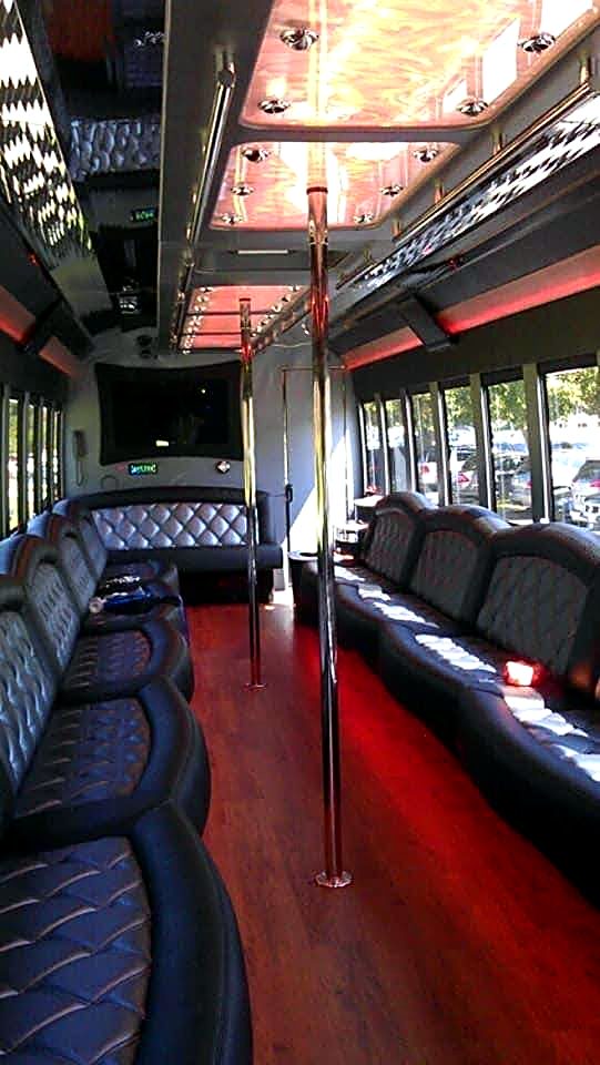 Party bus interior with dance pole