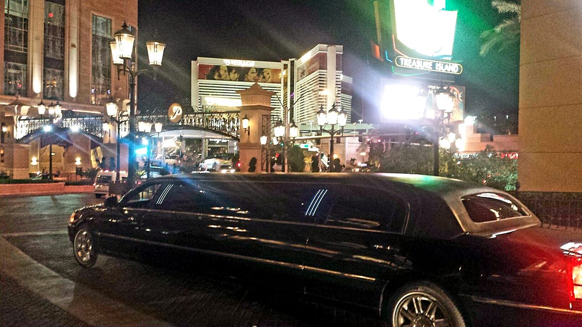 Lincoln Town Car stretch at night in the city