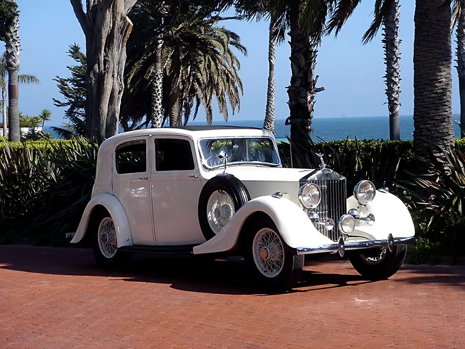 1938 Rolls-Royce beachside with palms