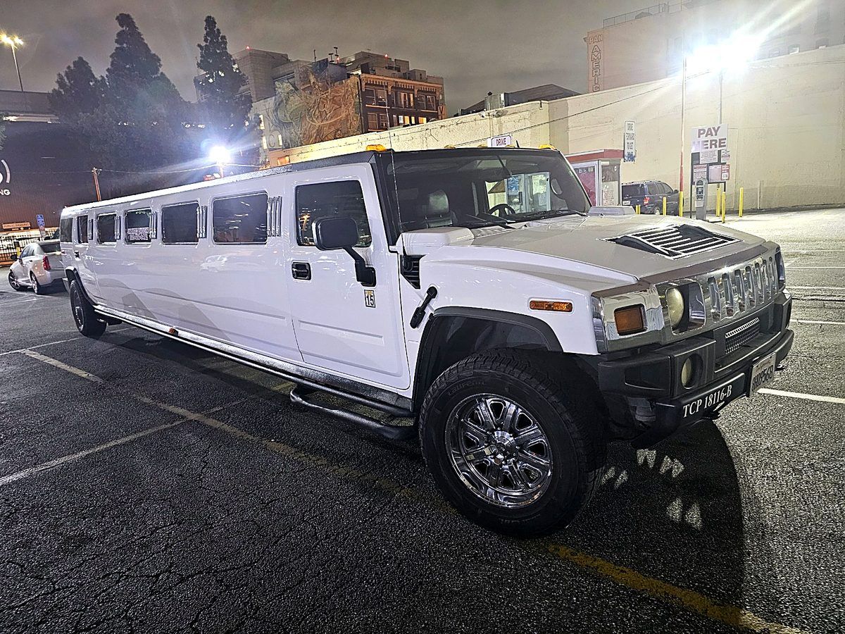 Hummer stretch at night for Halloween party bus runs